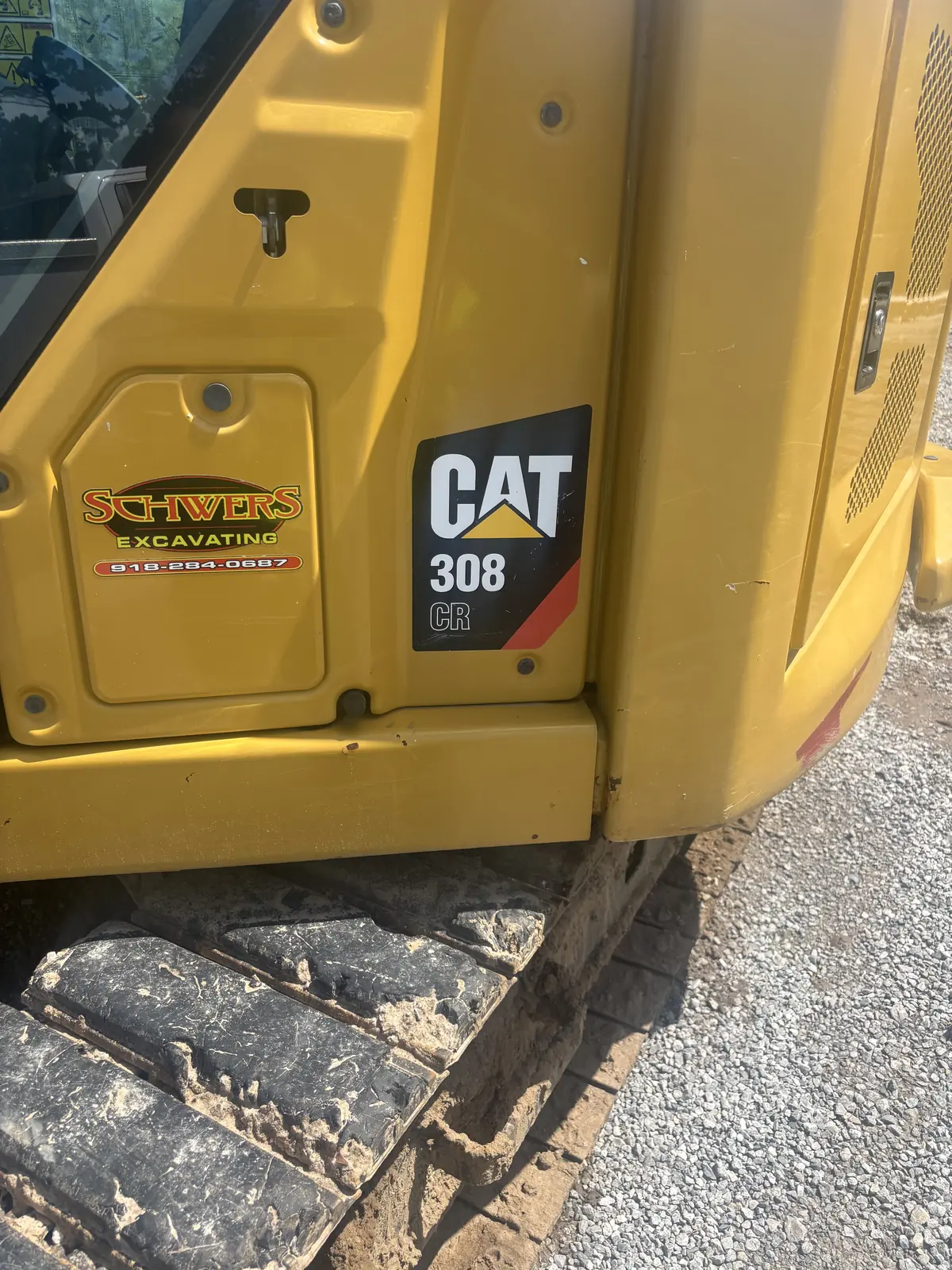 CAT 308 mini excavator serviced on-site in Tulsa