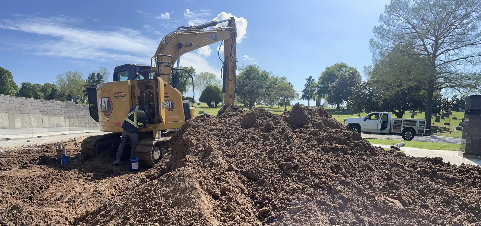 CAT excavator working a Tulsa-area construction jobsite