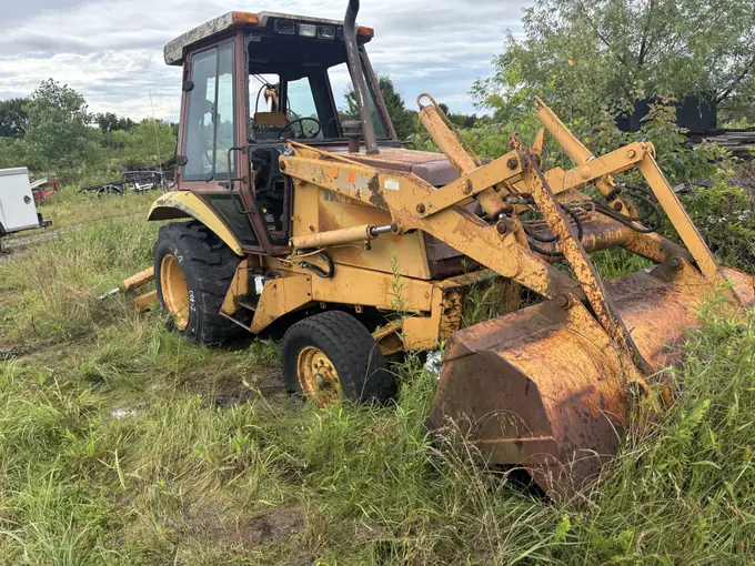 Backhoe loader evaluated for field repair