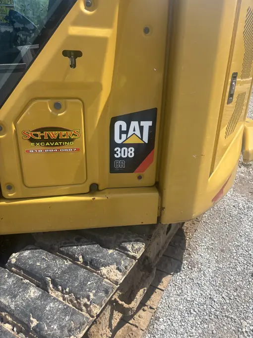 CAT 308 mini excavator serviced on-site in Tulsa