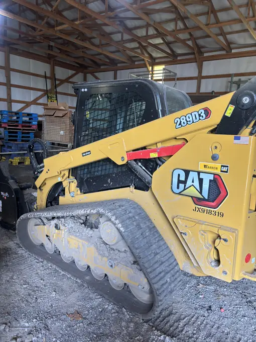 CAT skid steer loader undergoing mobile repair