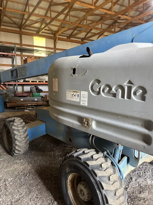 Genie boom lift undergoing shop service