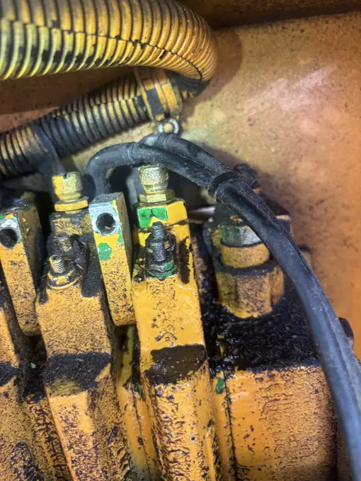 Hydraulic valve block repair on heavy equipment