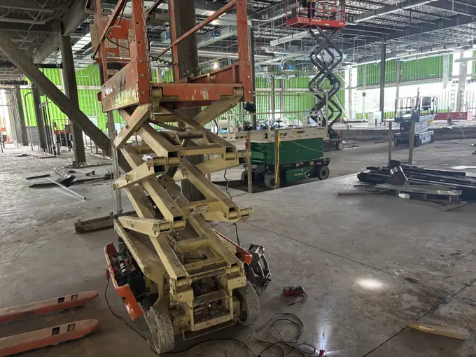 Scissor lift staged in the Tulsa Fleet Repair shop