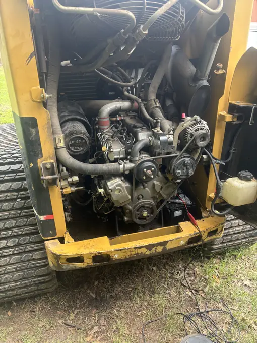 Skid steer engine bay serviced by fleet mechanics