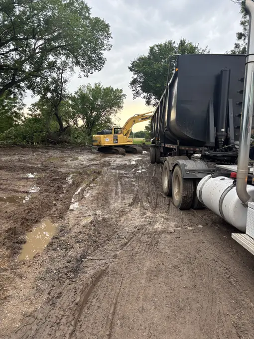 Emergency mobile recovery of a tanker truck stuck on a muddy jobsite